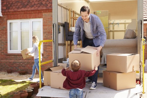 Unpacking boxes and organising items in a new home