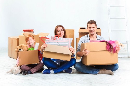 Reusable furniture and cardboard being separated for recycling
