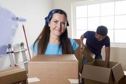 Packed boxes and furniture ready for a house move in Hillingdon