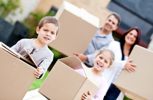 Professional movers handling a house move with care