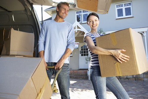 Local removals team preparing furniture for transport in Hillingdon
