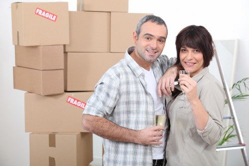 Packed office equipment ready for a business move in West London