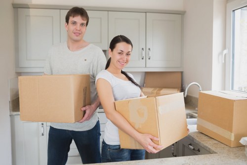 Careful unloading of belongings at a Hillingdon property